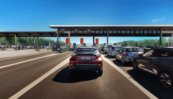 File d'attente de voitures à un péage autoroutier